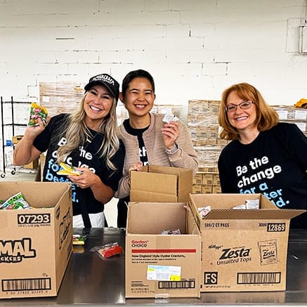 volunteers packing boxes